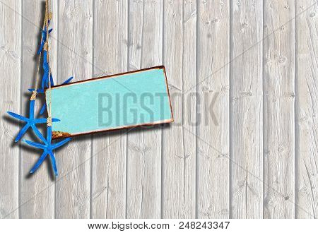 Boardwalk Planks Background With Blue Starfish And Turquoise Metal Plate For Copy Space