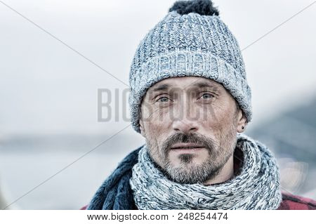 Portrait Of White Male In Winter Hat. Urban Male In Winter Hat. Closeup Of Non Shaved Guy In Knitted
