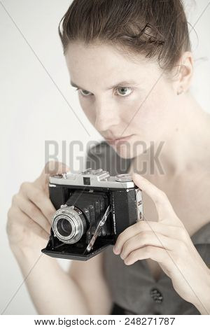 Young Woman With A Vintage Zeiss Camera