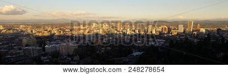 We See All The Buildings Across Downtown Portland With Mount Hood Visible At Sunset