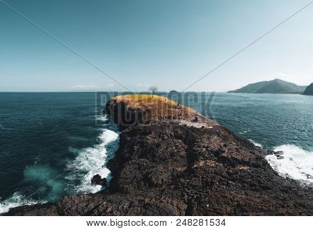 Aerial view of small island, Bukit Asah, new tourist attraction of tropical island Bali, Indonesia