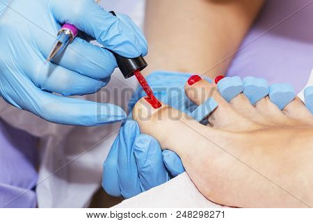Woman Feet Receiving Pedicure. Close Up Concept