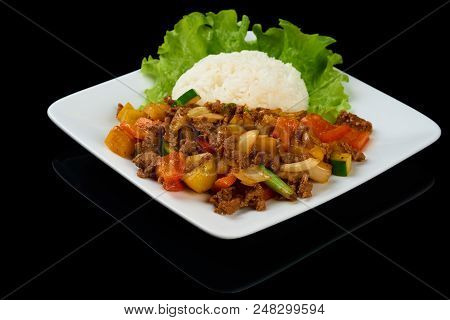 Vietnamese Dish Bo Luc Lac (saute Diced Beef) Is A Cubed Beef Sauteed With Cucumber, Tomatoes, Red O