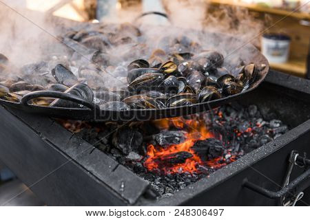 Fresh Mussels At Grill Pan. Seafood Barbecue Outdoors. Picnic Healthy Food, Mussels In Shells. Plent