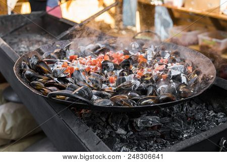 Fresh Mussels At Grill Pan. Seafood Barbecue Outdoors. Picnic Healthy Food, Mussels In Shells. Plent