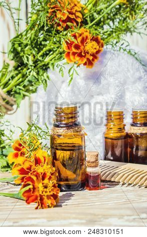 Nettle Tincture In A Small Bottle And Fresh Leaves On White Wood, Medicinal Herb For Overweight, Dia