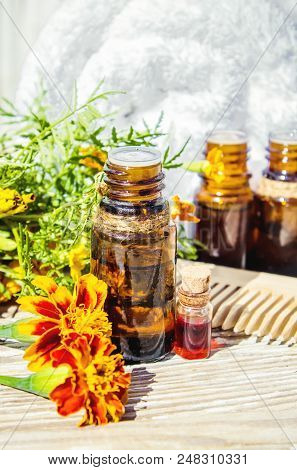Nettle Tincture In A Small Bottle And Fresh Leaves On White Wood, Medicinal Herb For Overweight, Dia