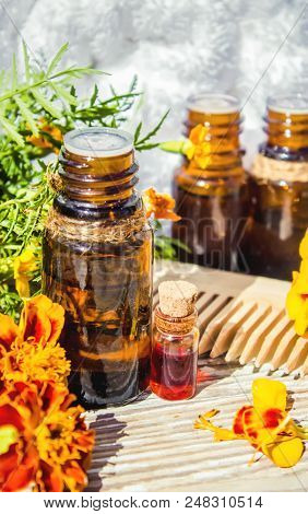 Nettle Tincture In A Small Bottle And Fresh Leaves On White Wood, Medicinal Herb For Overweight, Dia