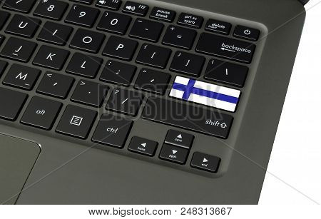 Flag Of Finland On Laptop Keyboard, Close-up.