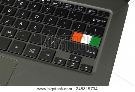 Flag Of Cote D, Lvoire On Laptop Keyboard, Close-up.