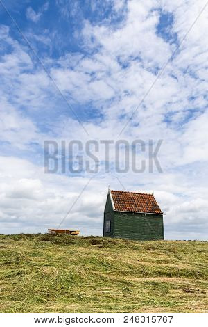 Schokland, Netherlands - June 23, 2018: Small, Wooden, Green House On Former Island Schokland, Unesc