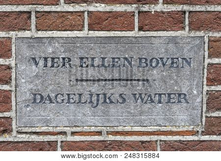 Schokland, Netherlands, June 23, 2018: Water Level Stone In Church Of Former Island Schokland, Unesc