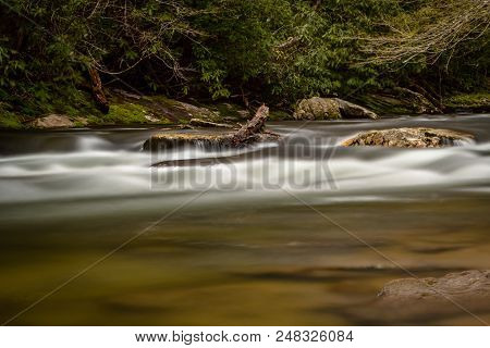 Smooth Water Flowing In Spring Creek In Smokies