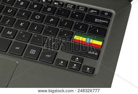 Flag Of Ethiopia On Laptop Keyboard, Close-up.