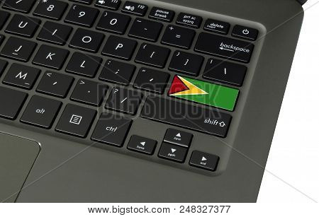 Flag Of Guyana On Laptop Keyboard, Close-up.