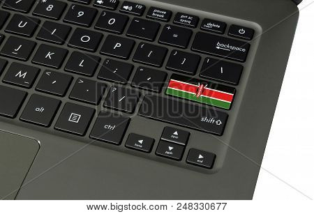 Flag Of Kenya On Laptop Keyboard, Close-up.