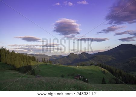 Photo Of Mountain Landscape In The Summer Under Beautiful Cloudy Sky. Ukraine, Carpathians, Dzembron