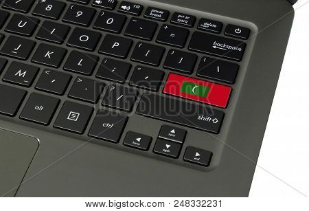 Flag Of Maldives On Laptop Keyboard, Close-up.