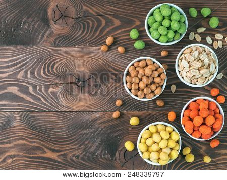 Assortment Of Different Peanuts Snack For Beer, Wine, Party Bar. Salted Peanuts, Peanuts In Coconut 