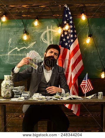 Economy And Finance. Economy Concept With Bearded Man Holding Money