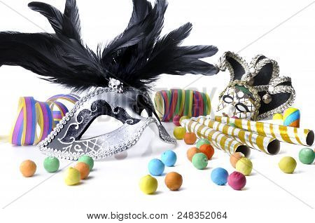 Beautiful Carnival Mask Among Colorful Cotillons On White White Background
