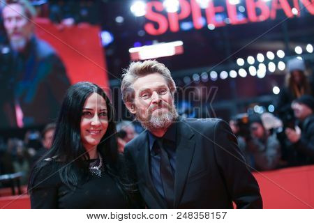Willem Dafoe (L) and his wife Giada Colagrande attend the Hommage Willem Dafoe during the 68th Berlinale International Film Festival Berlin at Berlinale Palast on February 20, 2018 in Berlin, Germany.