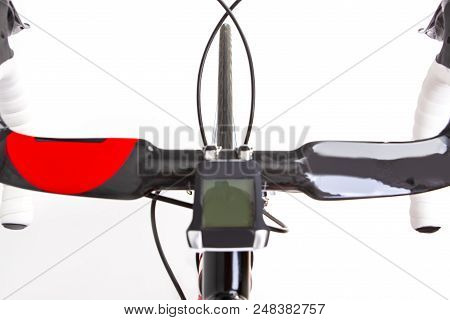 Road Cycling Concepts.extreme Closeup Of Professional Carbon Aero Handlebars With Cycling Computer I