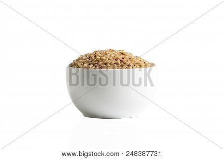 Mix Of Brown Rice And Quinoa In A Cup Isolated On A White Background.