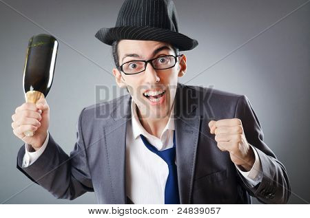 Kaufmann mit Flasche Champagner