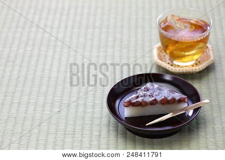  japanese traditional sweet dessert served with barley tea, wagashi and mugicha