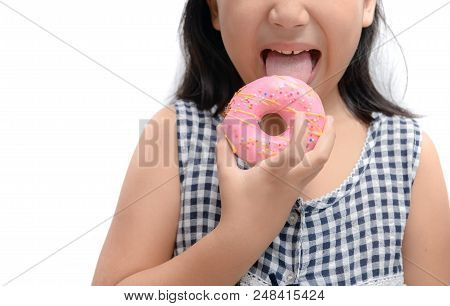 Little Happy Cute Girl Is Eating Donut Isolated