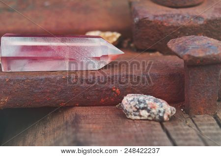 Large Transparent Mystical Faceted Crystal Of Colored Pink Amethyst, Chalcedony On A Rails On Indust