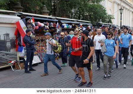 ST. PETERSBURG, RUSSIA - JUNE 17, 2018: Football fans going to FIFA Fan Fest in Saint Petersburg during the FIFA World Cup Russia 2018. The city hosts 7 matches of FIFA World Cup