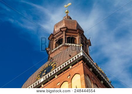 Riga, Latvia - May 06, 2017: View On Tower Of Riga Cathedral Is  Located In The City Center Of Riga.