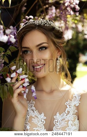 Beautiful Young Woman Bride  In Luxurious Wedding Dress And Diadema