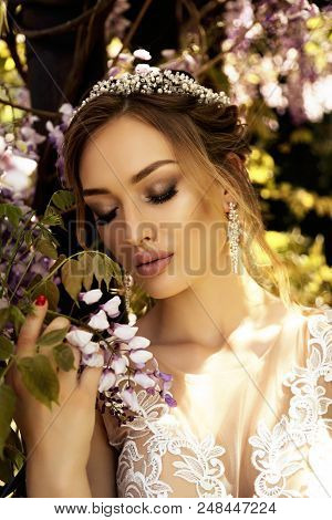 Beautiful Young Woman Bride  In Luxurious Wedding Dress And Diadema