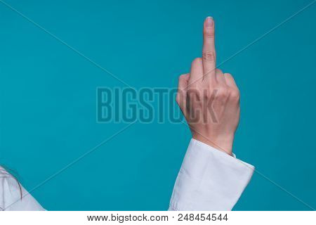Business Caucasian Woman In Office White Clothes Hand Shows Aggressive Gesture With The Middle Finge