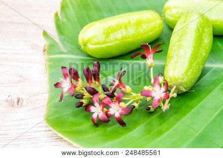 Averrhoa Bilimbi Fruit With Flowers On Banana Leaf