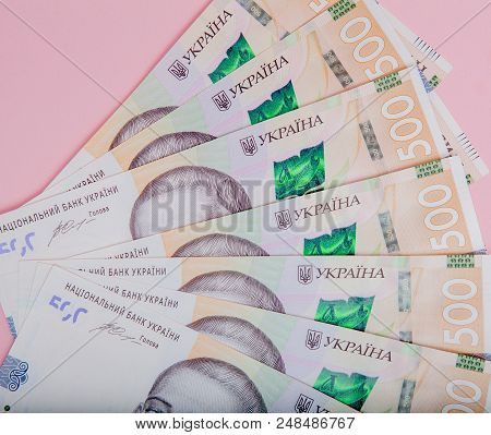 Modern Ukrainian Money On Pink Background - Hryvnia . 500 Banknotes. Uah. Money Concept.