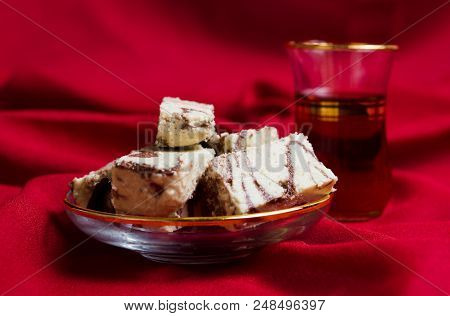 Halva With Cacao Served With Tea On A Plate
