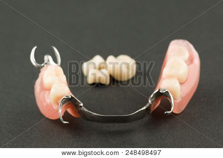 Large Image Of A Modern Denture On A Black Background