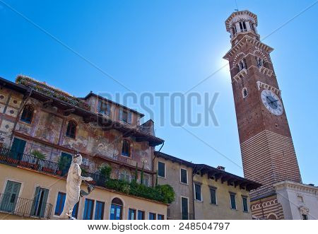 Verona, Italy - August 7, 2010: The Ancient Architectures Of  Delle Erbe Square With The Dei Galimbe
