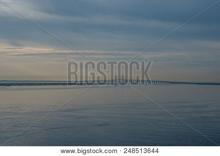 Oresund Bridge In Denmark During Sunrise Seen From Curiseship Morning