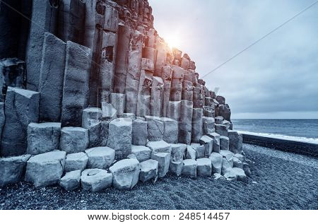 A unique rock on the Atlantic Ocean. Basalt rocks 