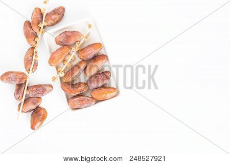 Dates Fruit In Ceramic Bowl White Background,dried Date Palm Fruits Top View