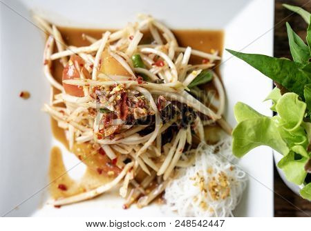 Close Up Top View Thai Spicy Green Papaya Salad With Pickled Fish Delicious Thai Food Cuisine, Som T
