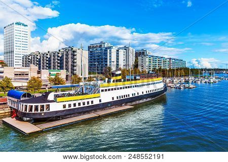 Scenic Summer View Of Pier Architecture And Docked Motor Boats And Yachts In Hakaniemi District In H