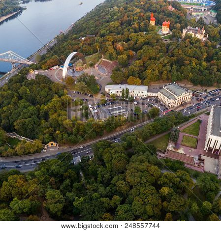 Panoramic View Of A Modern City At Sunset. Skyline Bird Eye Aerial View Of The Old Part Of The City 