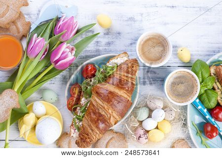 Easter Breakfast Flat Lay With, Bread Toast With Fried Egg And Gre, Colored Quail Eggs And Spring Ho