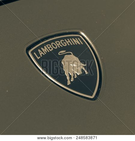 Vintage Tone Lamborghini Logo On Grey Aventador